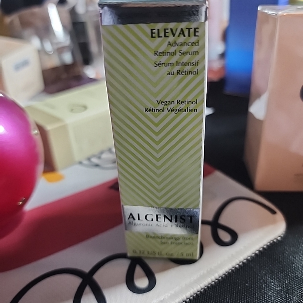 Algenist Elevate Retinol Serum in Green and White